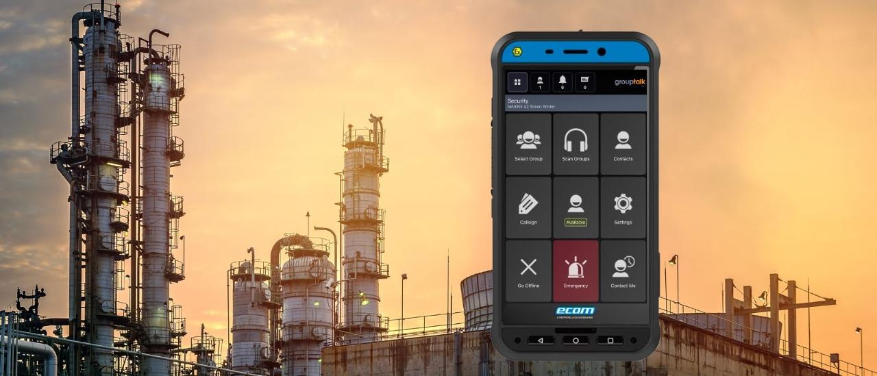 ATEX Smart EX02 smartphone for explosive hazardous work environments. Picture of a factory