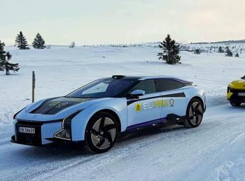 Row of electric cars in snowy landscape at El Prix 2024.