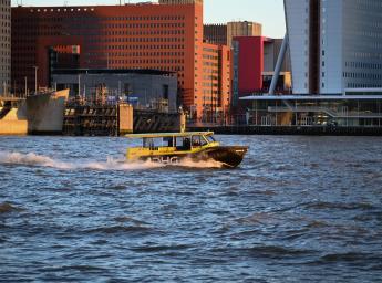 Watertaxi in Rotterdam on the go.