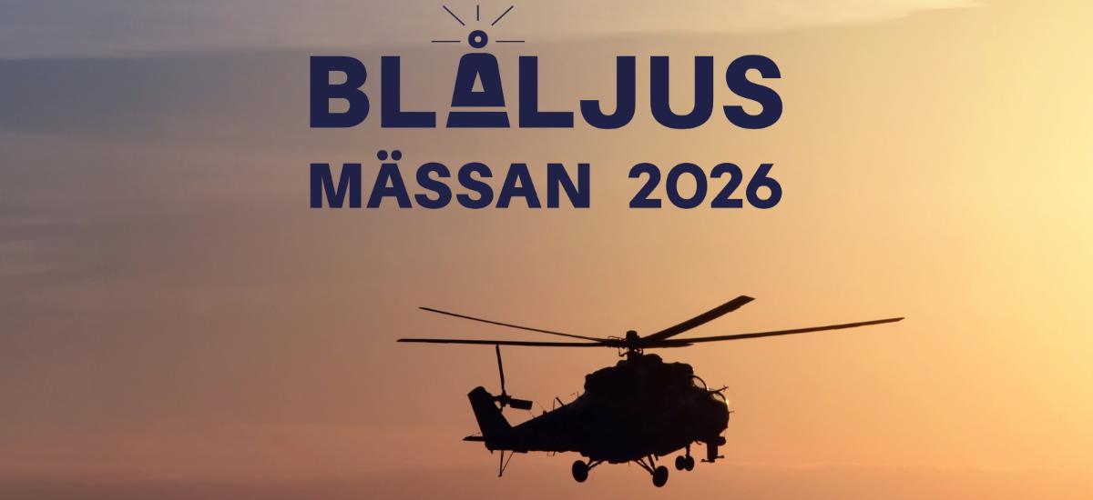 Helicopter in the air during sunset.