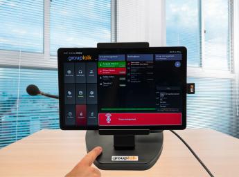 Imtradex mobile desk unit with push-to-talk app installed.