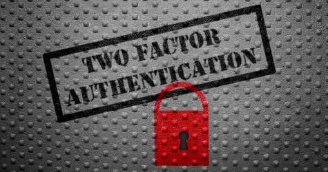 Lock with the text two factor authentication
